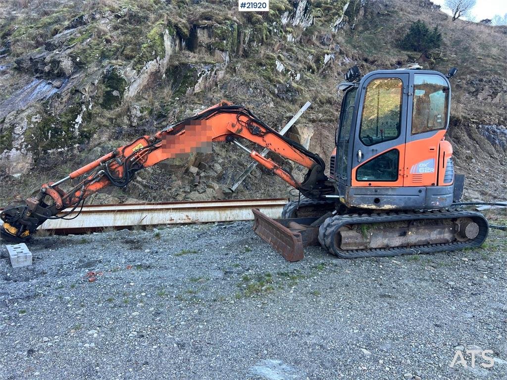 Doosan DX62R-3 excavator w/ rototilt, sanding bucket and 2015 21920 DX62R-3 excavator w/ rototilt, sanding bucket and 2015...