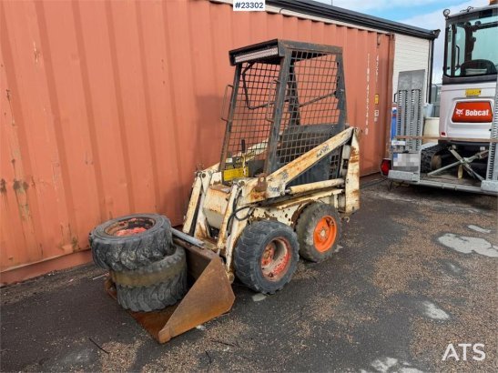 Bobcat 34.3 skid steer loader w/ extra tires and bucket. 34.3 skid steer loader w/ extra tires and bucket. 1986 2