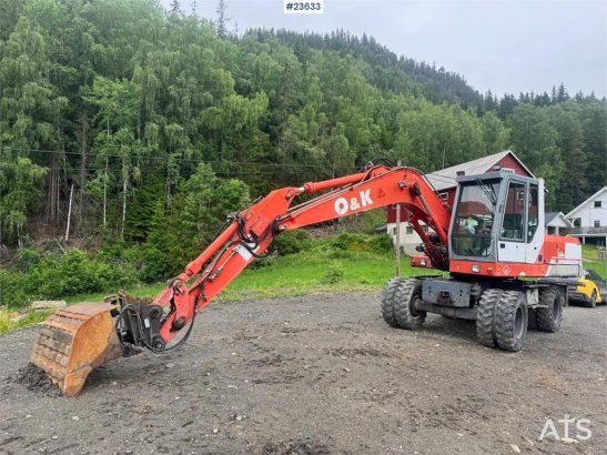 O&K MH4 Wheeled Excavator with Grading Bucket WATCH VI MH4 Wheeled Excavator with Grading Bucket WATCH VI 1998 2 Wheeled E...